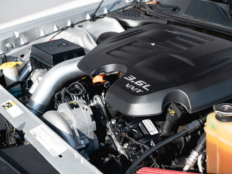 Detailed view of RIPP supercharger system parts, highlighting precision craftsmanship and quality materials